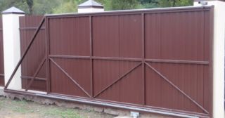 Купить откатные ворота из профнастила Шелехов, цена от 1795 руб.