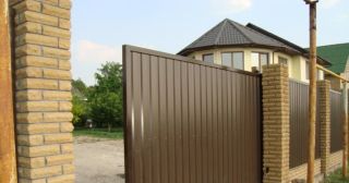Купить откатные ворота из профнастила Шелехов, цена от 1795 руб.